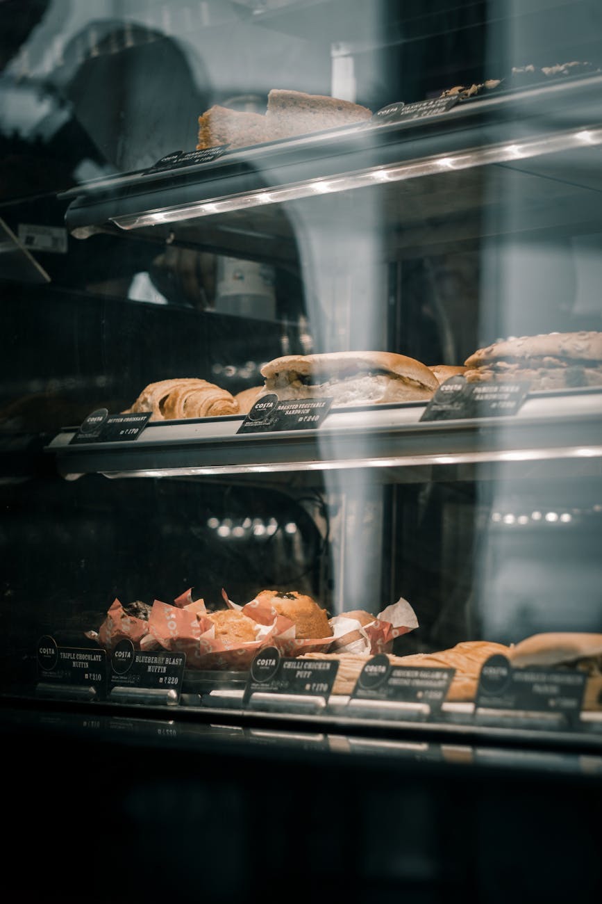 Styled pastry display counter with professional lighting